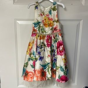 Beautiful floral dress with beaded waistline and tulle underlay